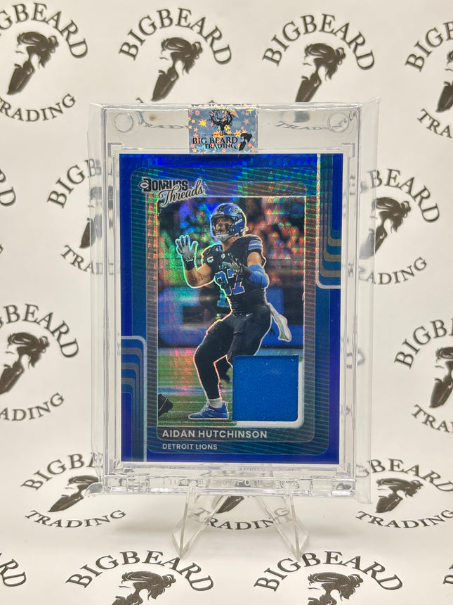 2025 Optic Football Aidan Hutchinson Blue Prizm Threads #DTBH-AHN Lions